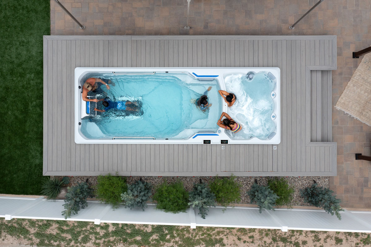 Endless Pool swim spa overhead view of boy swimming